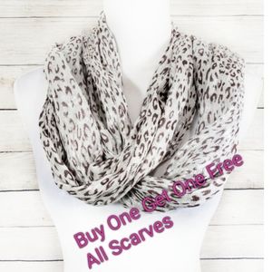 F89 Shiny Animal Print Scarf with Tassels
